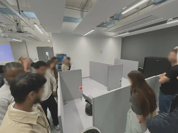 Students testing their solution to the group project in the real-world